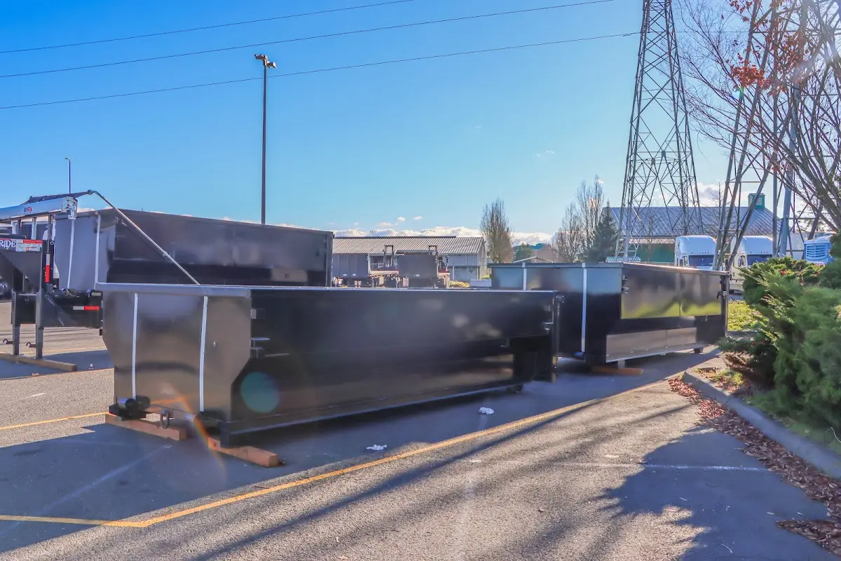 Roll-off dumpster ready for waste disposal at job site for Concrete Dumpster Rental in Dover